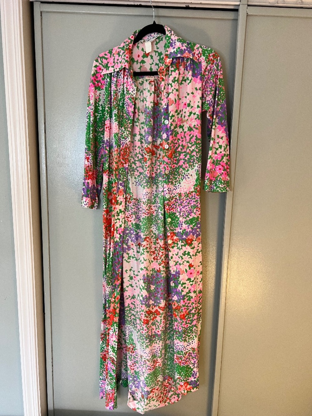 Floor length pink robe with flowers